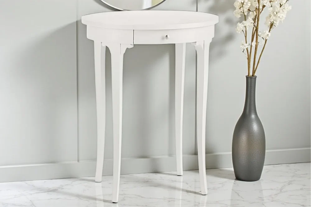 Tavolino ovale laccato bianco con cassetto