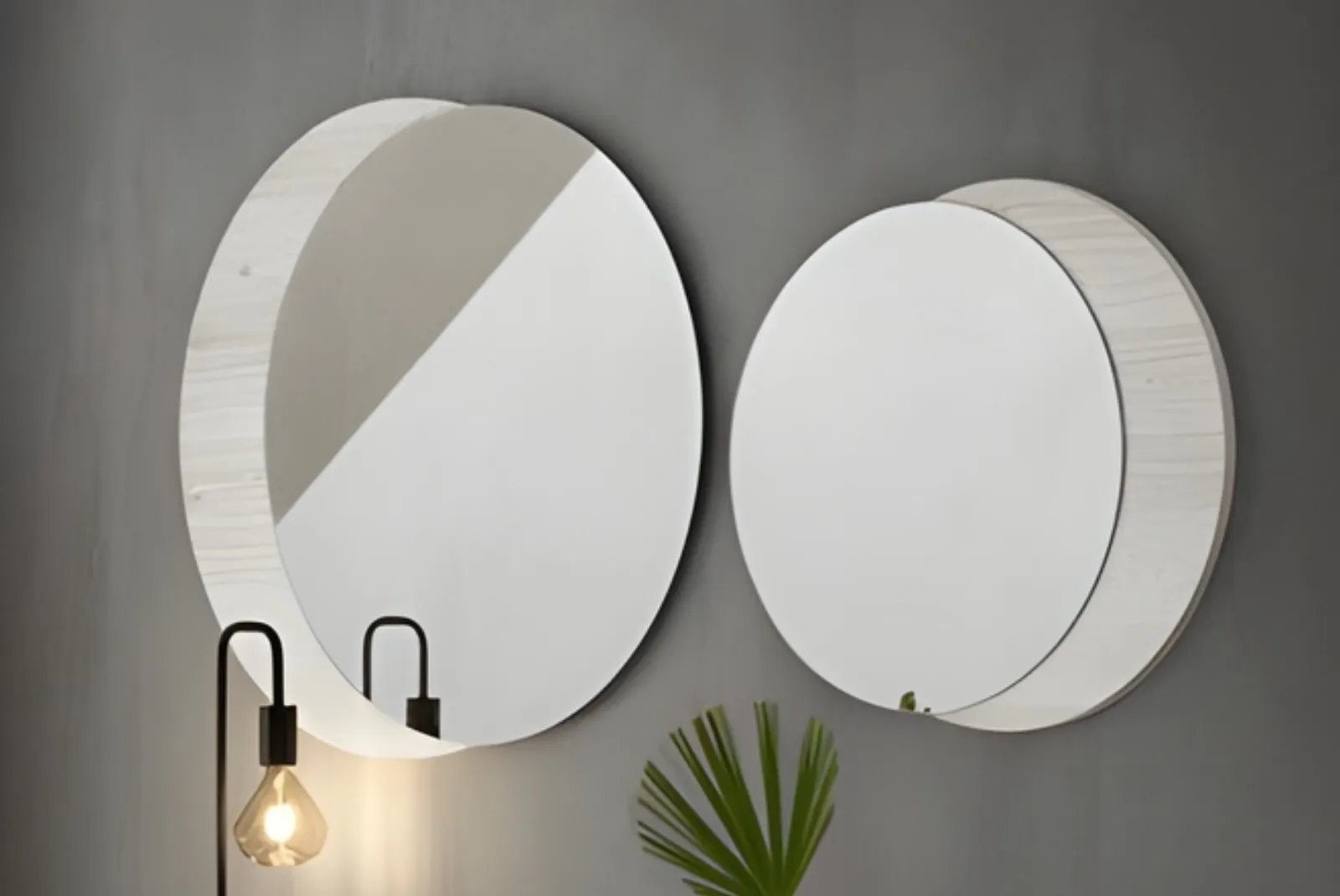 Zoom specchi tondi con pannelli in finitura rugby