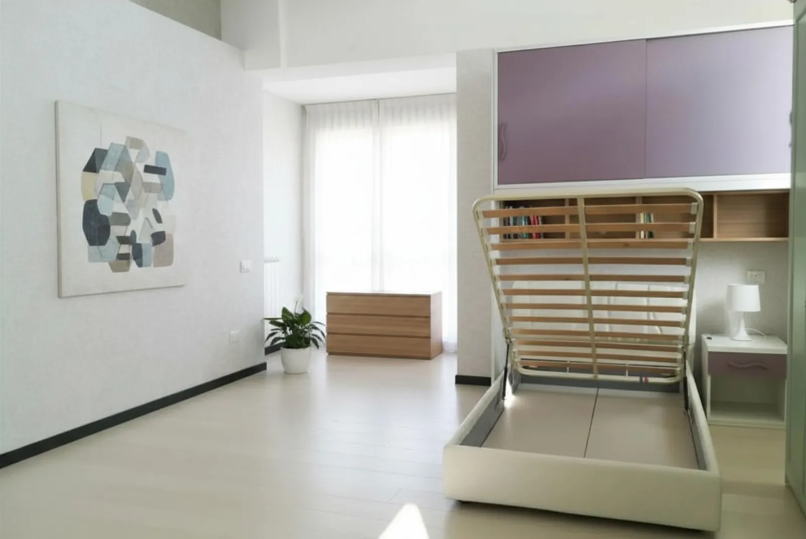 vista interna letto con contenitore Giessegi